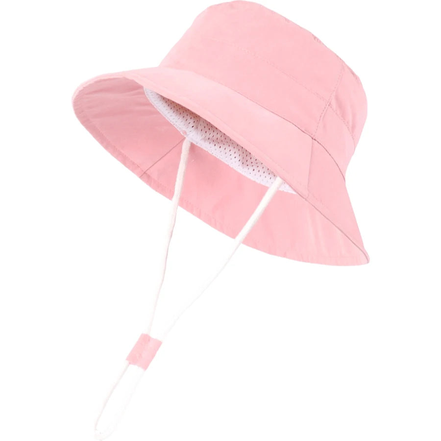Light pink baby and toddler wide brim bucket sun hat with adjustable chin strap.
