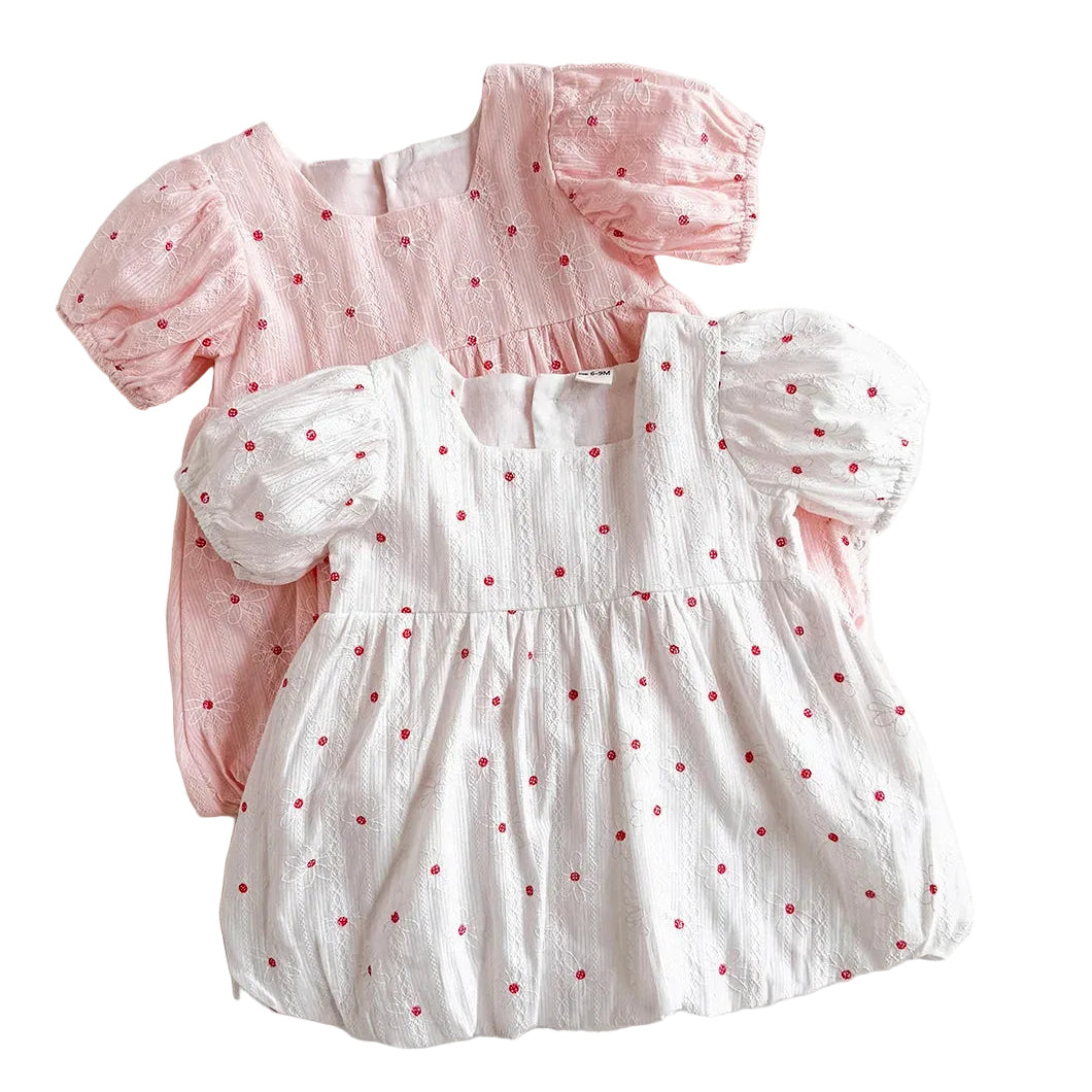 Comparison view of the baby and toddler girl floral embroidery bubble dress available in Vintage White and Petal Pink color options.