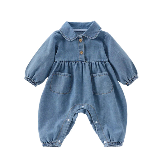 Full front view of a blue denim long-sleeve playsuit for baby and toddler girls, featuring a Peter Pan collar, front pockets, and elastic cuffs.