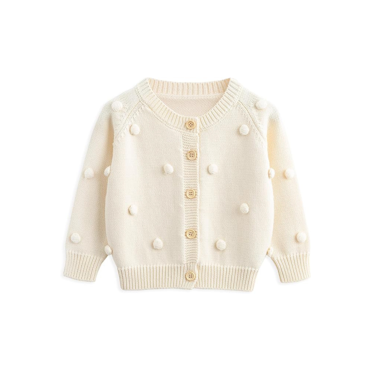 Front view of the baby and toddler girls cream cotton knit cardigan featuring 3D pom-poms and wooden buttons.