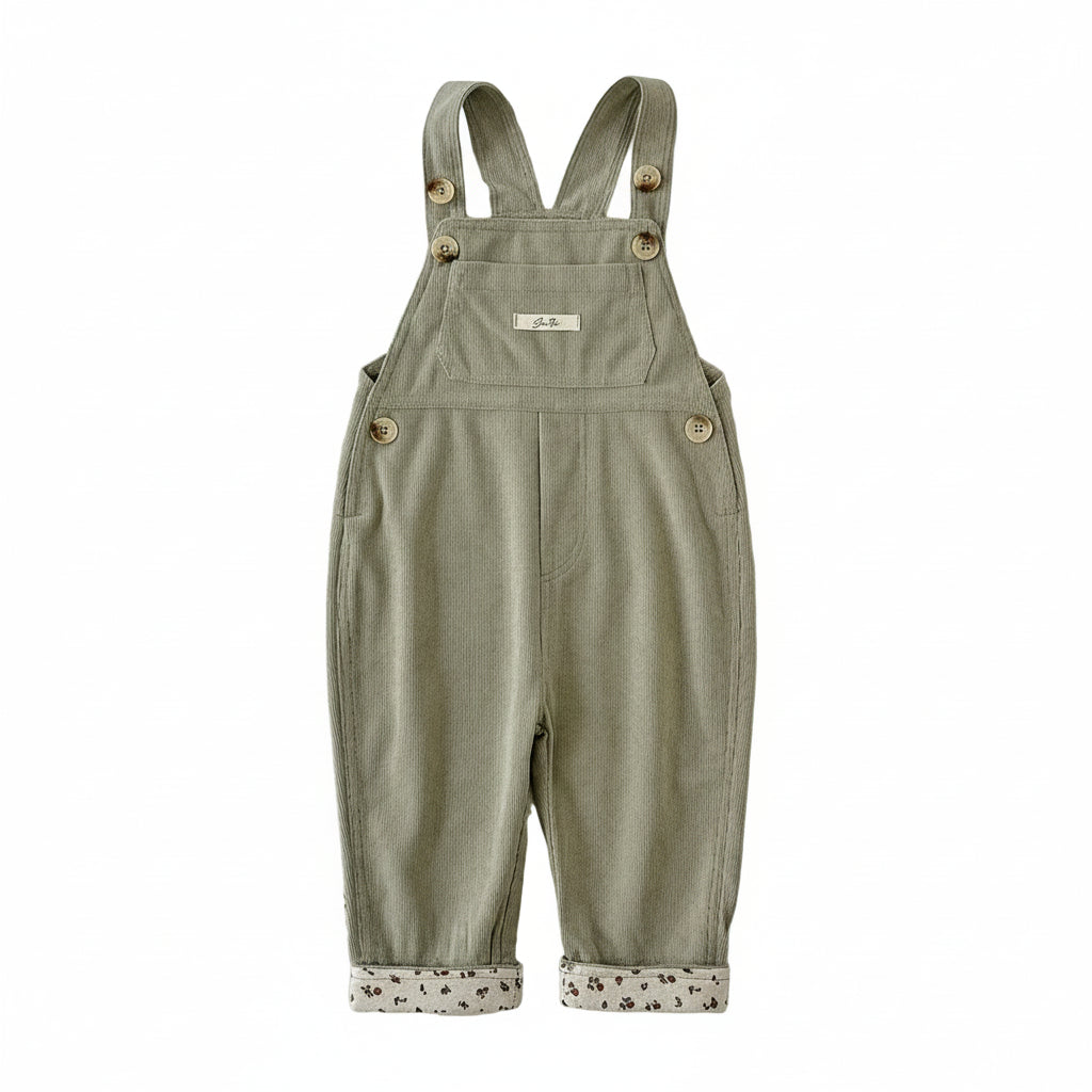 Baby and toddler girls sage green corduroy overalls with rolled floral cuffs shown from the front on a plain white background.