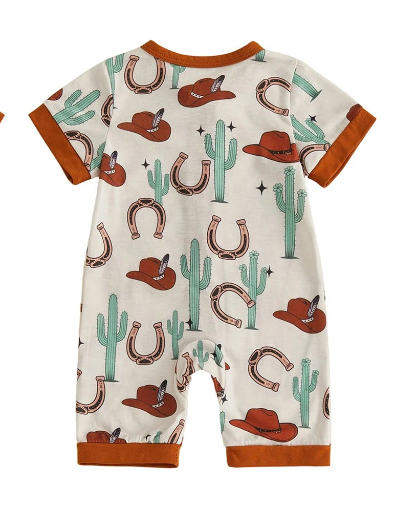 Back view of a cream infant short sleeve zip-up romper with a desert cactus, cowboy hat, and horseshoe pattern.
