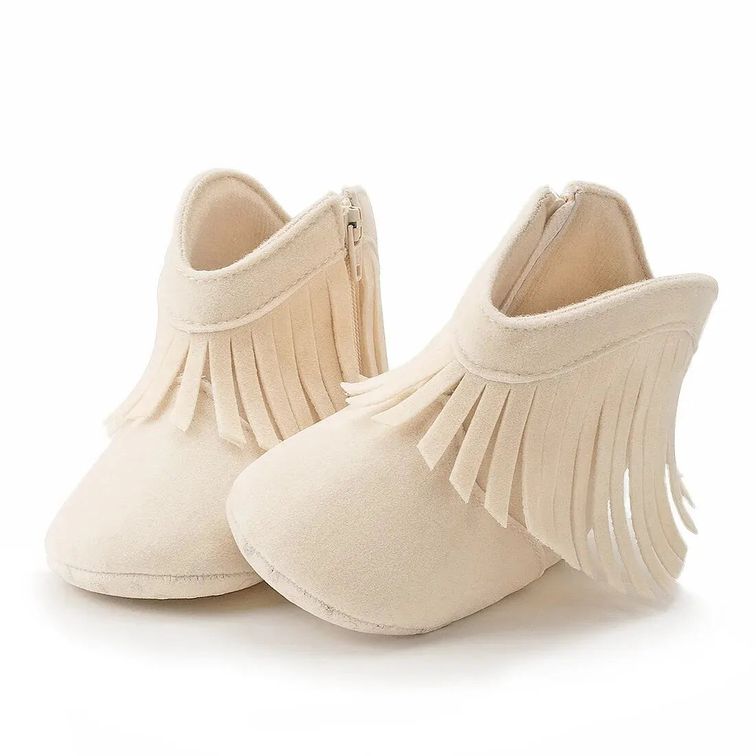 Pair of cream off-white infant fringe suede moccasin booties on a white background.