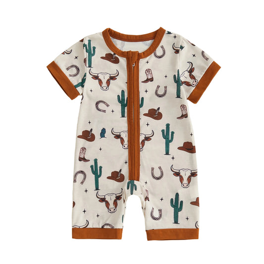 Front view of a cream-colored infant baby short sleeve zip-up romper featuring a western longhorn skull, cactus, and cowboy hat print with brown trim.