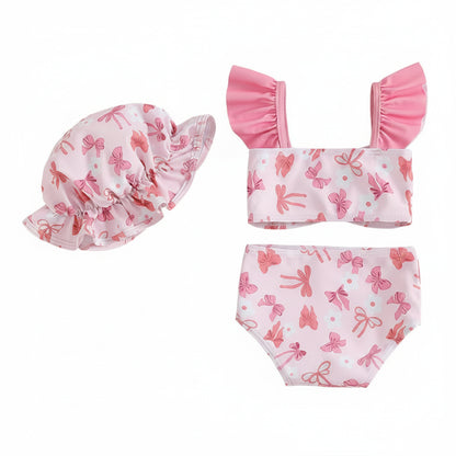 Back view of baby swimsuit set with pink bows on a white background