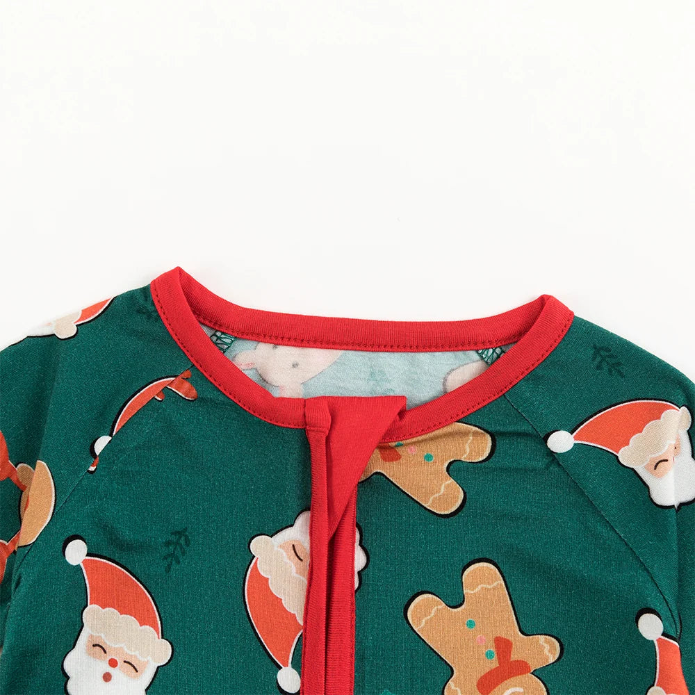 Close-up view of red neckline trim and protective zipper guard on Kidsely Santa and reindeer bamboo baby sleeper