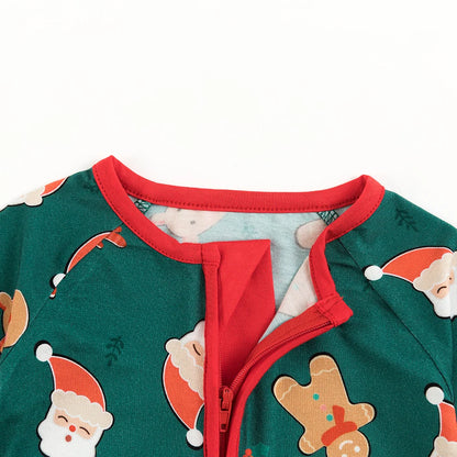 Detail of unzipped neck showing interior protective fabric zipper guard on Kidsely Santa print bamboo romper