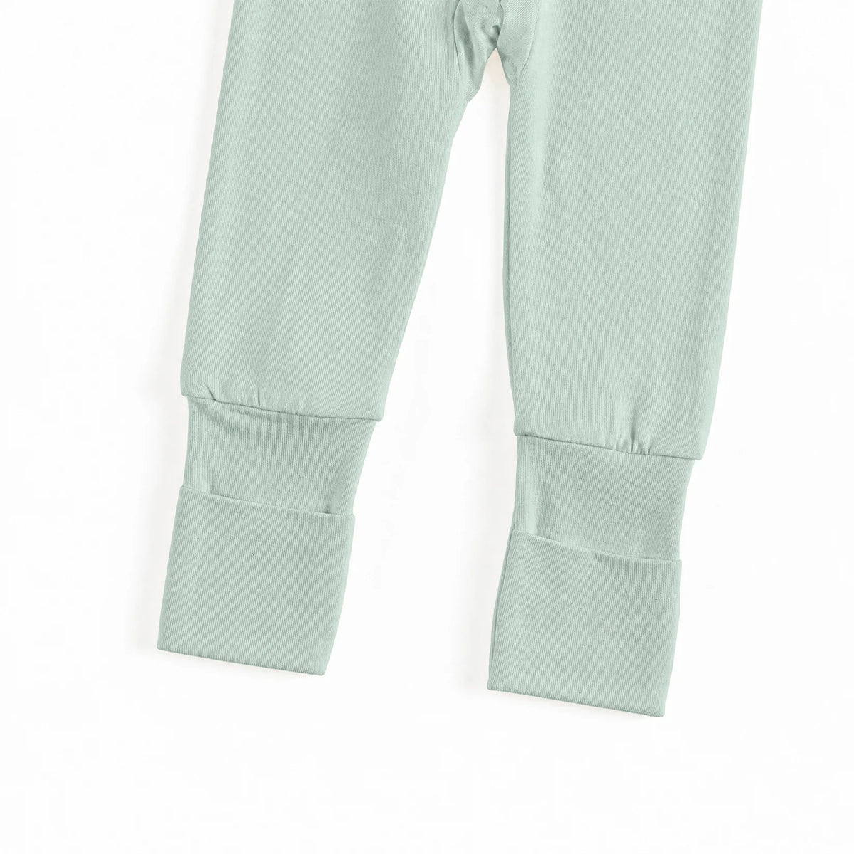 Close-up view of convertible fold-over footie cuffs on Kidsely solid sage green bamboo viscose baby romper