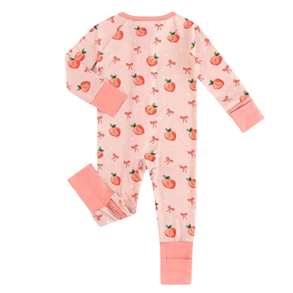 Back flat lay view of Kidsely bamboo viscose baby zipper romper sleeper in sweet peach and ribbon bow print