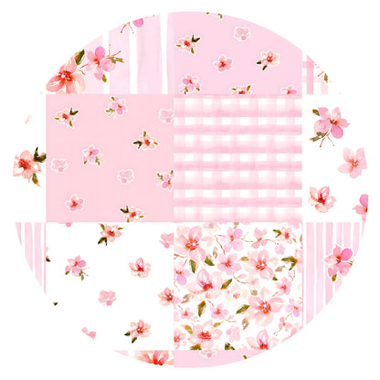 Close-up swatch detail of pink floral, gingham, and stripe patchwork quilt print on soft bamboo viscose