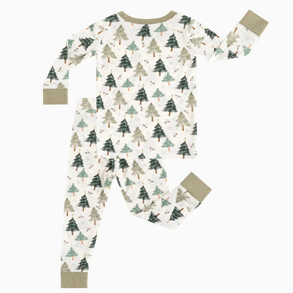 Flat lay view of Kidsely bamboo viscose toddler two-piece pajama set in Evergreen Christmas Trees print
