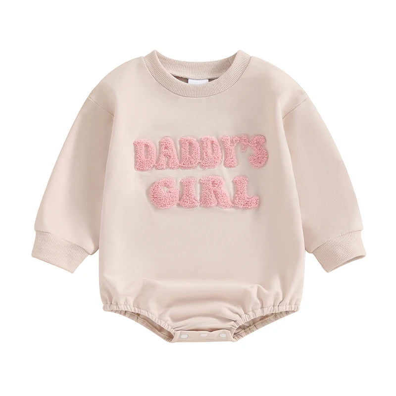 Beige Baby Girls "Daddy's Girl" long sleeve sweatshirt bubble romper with pink fuzzy letters on a white background.