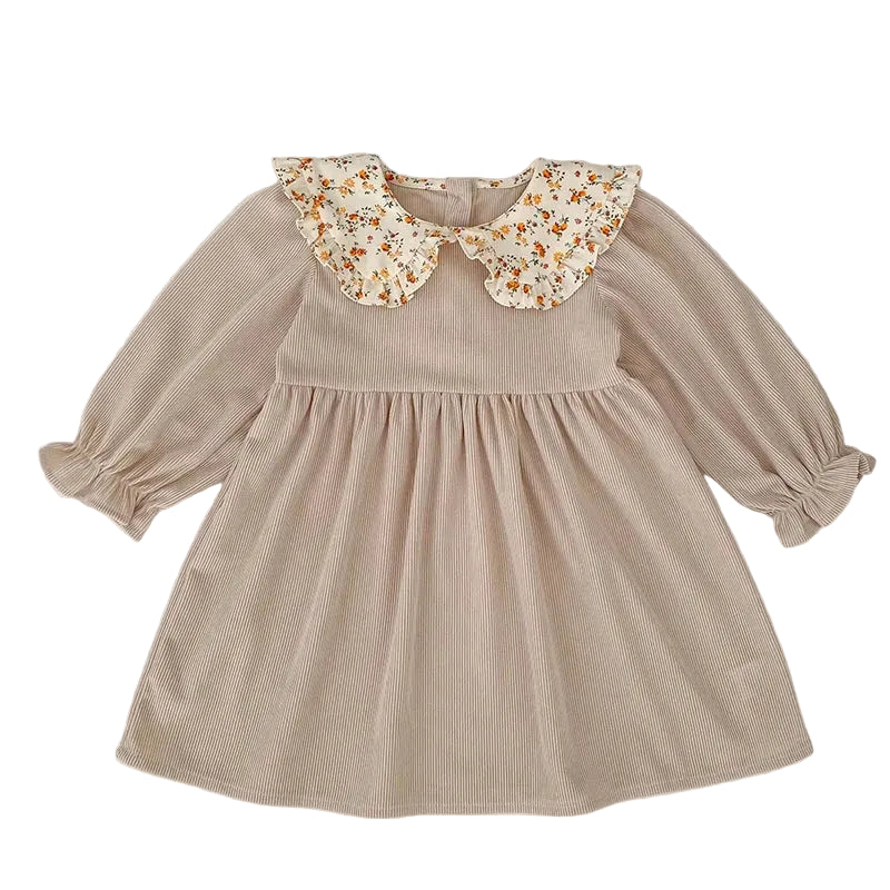 Front view of a beige ribbed corduroy long-sleeve toddler dress with a floral ruffled Peter Pan collar.