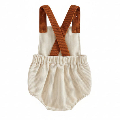 Back view of the beige baby corduroy bubble romper showing the criss-cross design of the brown shoulder straps.