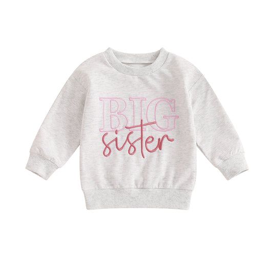 Light gray long-sleeve toddler girls sweatshirt featuring a pink Big Sister graphic on a white background.