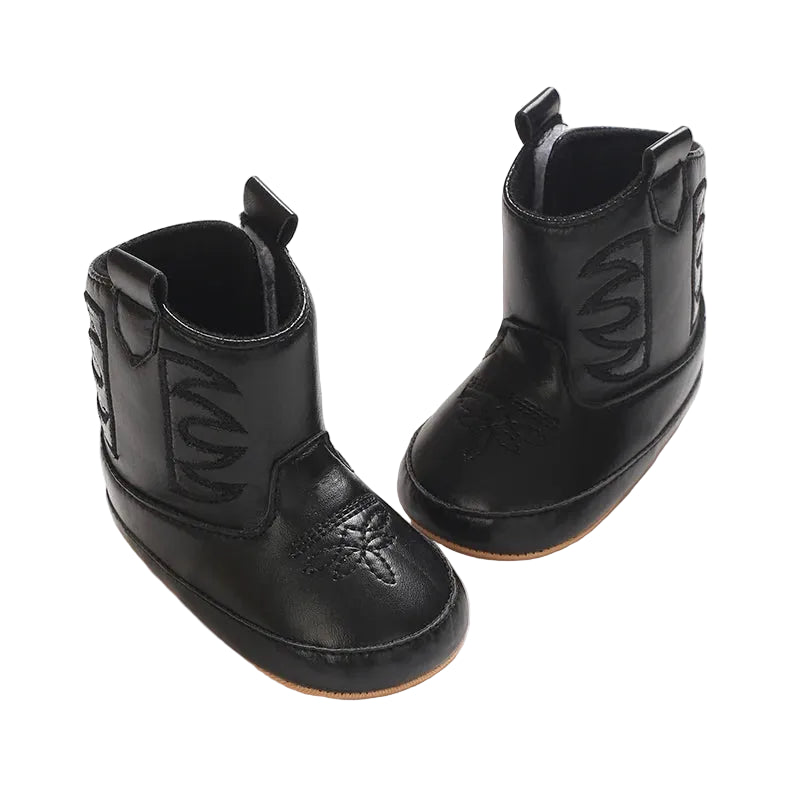 High angle view of two black PU leather baby cowboy boots, showing the wide top opening designed for easy on and off.