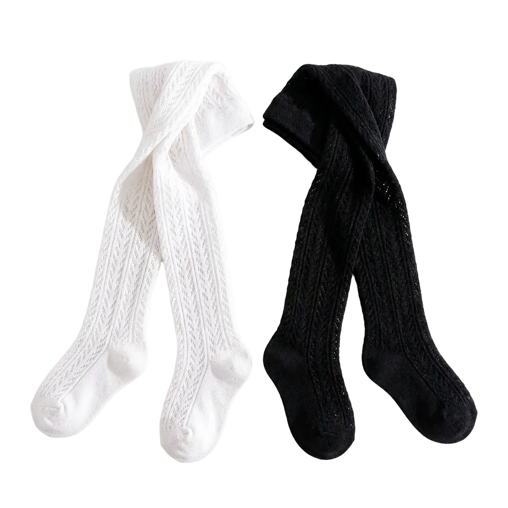 Flat lay of black and white chevron toddler tights.