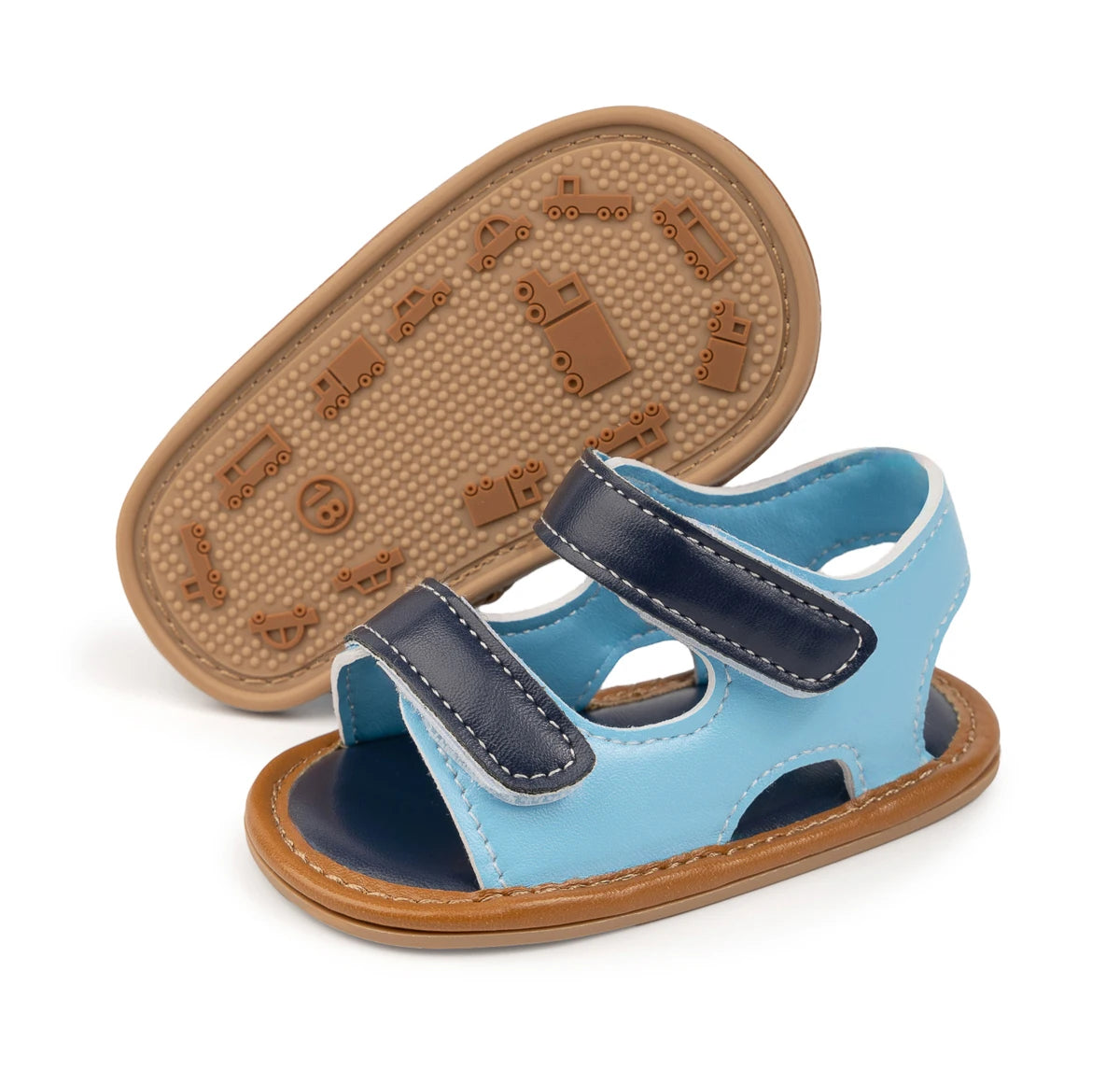 Side angle of light blue and navy infant sandals showing the flexible sole.