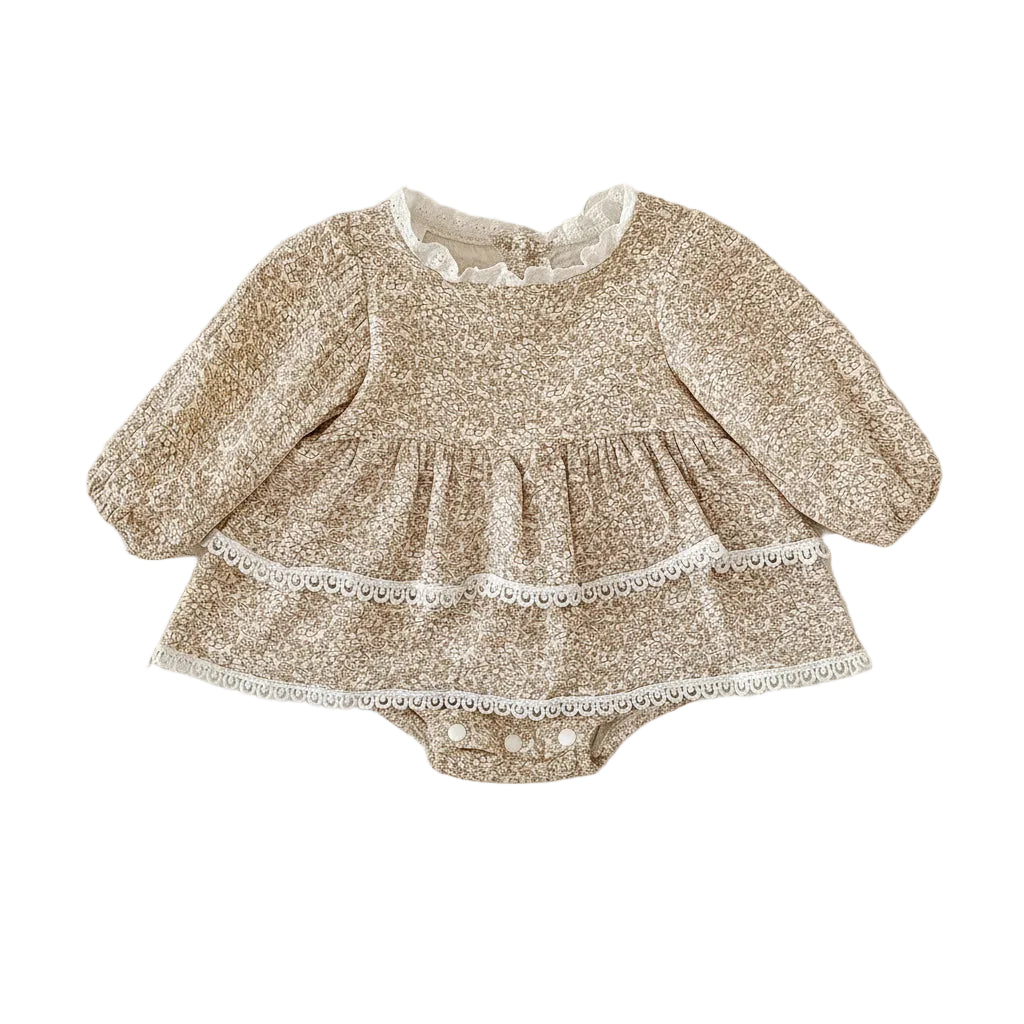 Front view of the beige Boho Floral Long Sleeve Romper Dress for baby girls, featuring a tiered ruffle skirt and white scalloped lace trim.