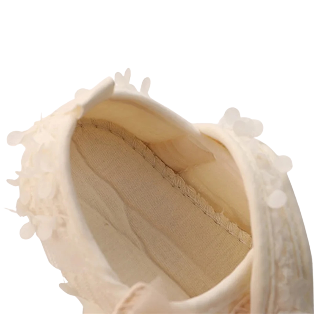 Interior view showing the soft padded insole and breathable cotton lining of Kidsely baby flats.