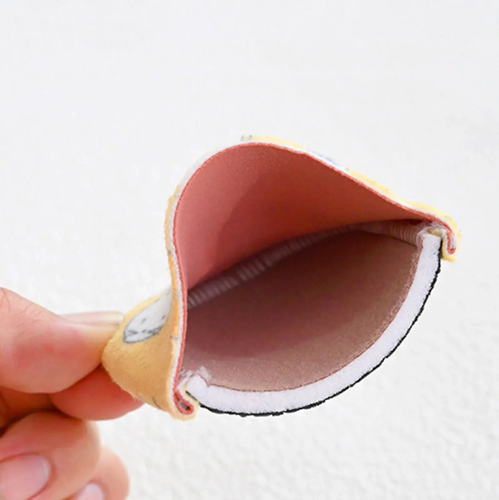Close-up cross-section view of a Kidsely aqua sock showing the soft, padded lining and durable stitching inside the shoe.