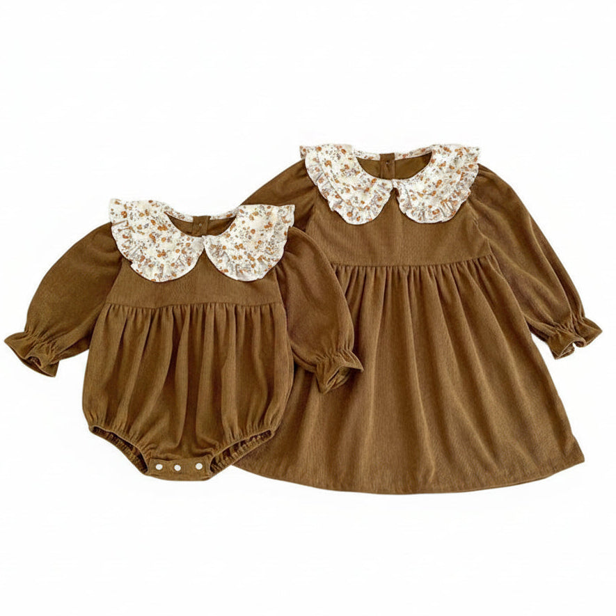 Front view of a matching brown corduroy baby romper and toddler dress set.