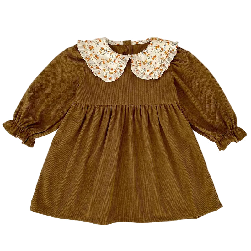 Front view of a rich brown ribbed corduroy long-sleeve toddler dress with a floral ruffled Peter Pan collar.