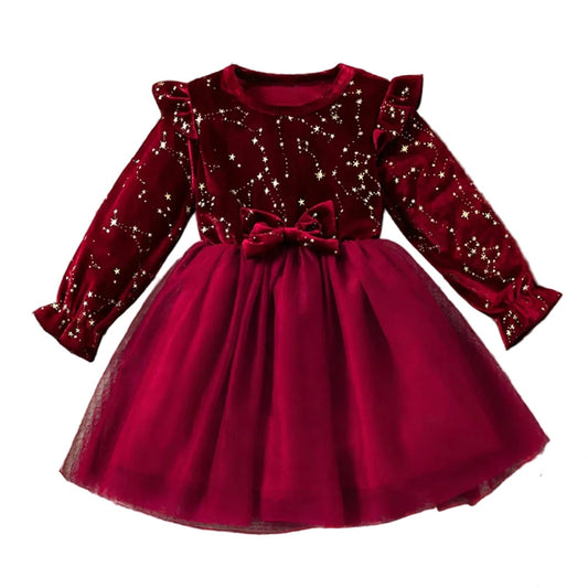 Burgundy stretch velvet and tulle girls Christmas party dress featuring a gold star pattern and front waist bow.
