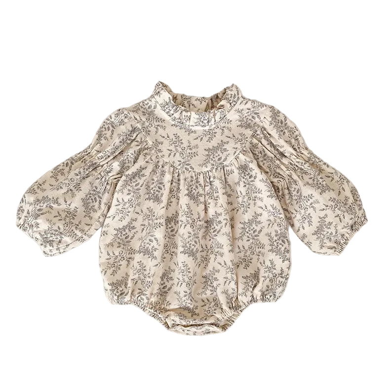 Full front view of a cream and gray floral baby bubble romper with long puff sleeves and a ruffle collar, laid flat.