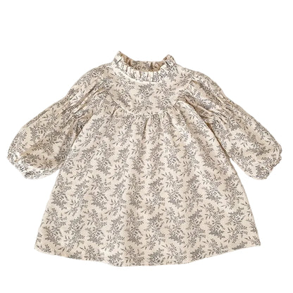Full front view of a vintage-inspired girls cream and gray botanical floral dress with long sleeves, laid flat.