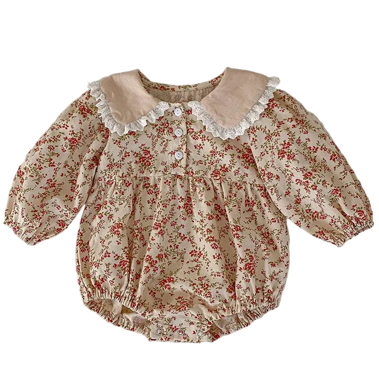 Full front view of the cream vintage floral baby girl bubble romper featuring long sleeves, a relaxed fit, and a lace-trimmed Peter Pan collar.