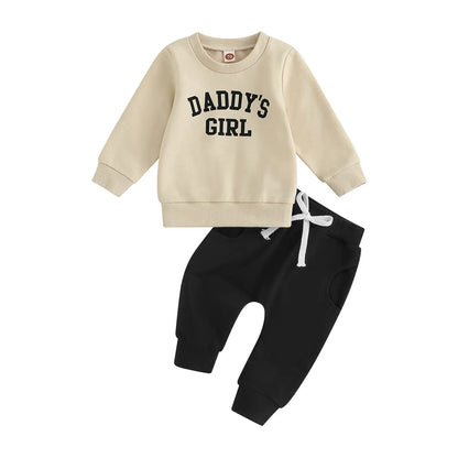 Cream and Black Baby Girls Daddy's Girl 2-piece sweatshirt and sweatpants fall outfit on a white background.