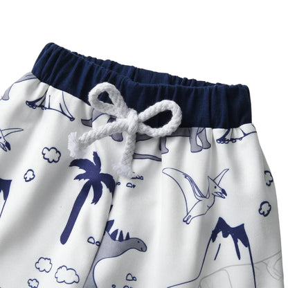 Close-up of the elastic waistband and white decorative drawstring on the baby boy dinosaur print sweatpants.