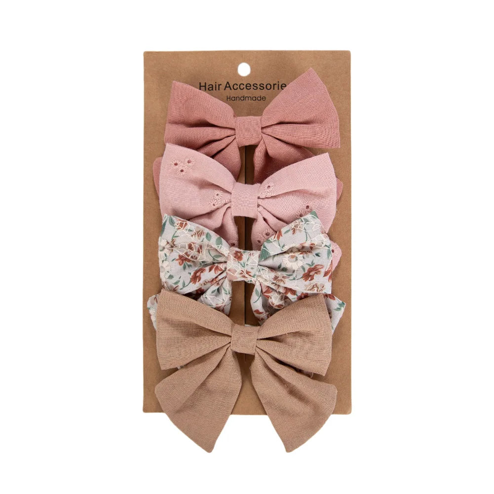 Kidsely English Rose large fabric bows with mauve embroidery, vintage floral prints, and white daisy lace details.