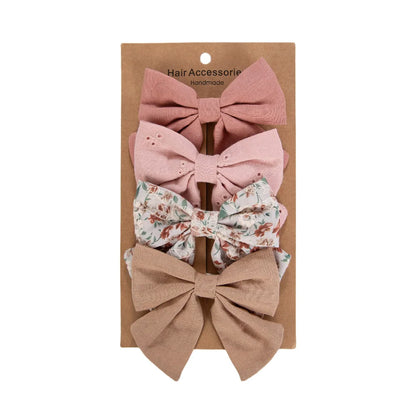 Kidsely English Rose large fabric bows with mauve embroidery, vintage floral prints, and white daisy lace details.