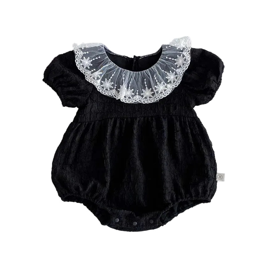 Classic Noir black baby romper with white lace collar, a sophisticated dress alternative for formal evening weddings.