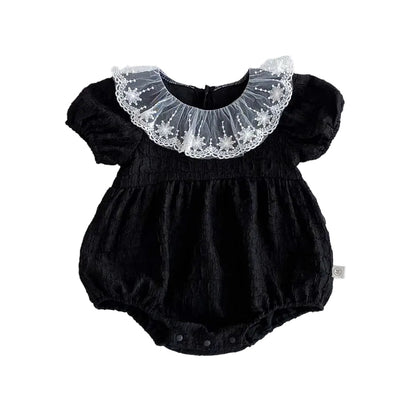 Classic Noir black baby romper with white lace collar, a sophisticated dress alternative for formal evening weddings.