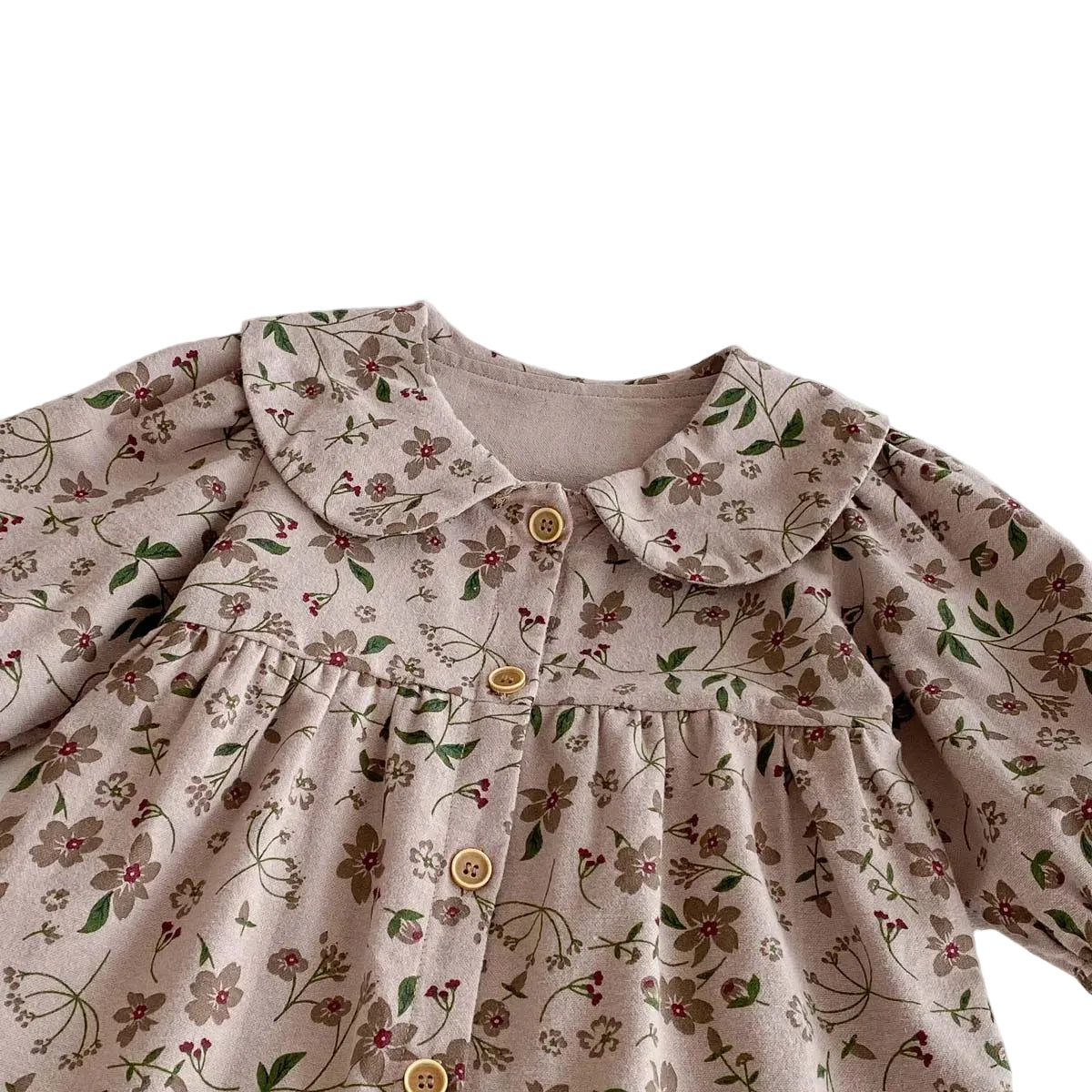 Close-up showing the gently gathered chest and earthy floral pattern on the vintage mauve baby jumpsuit.