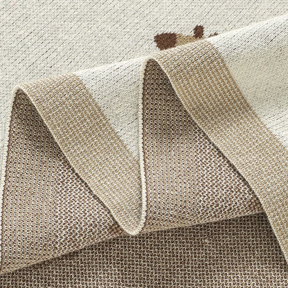 Close-up showing the breathable knit texture and neatly finished edges of the baby blanket
