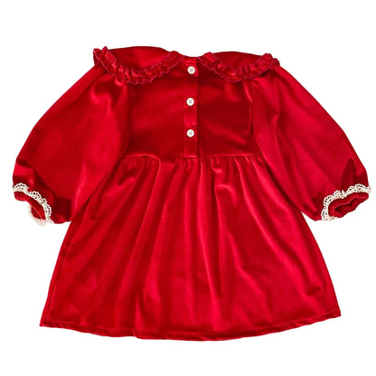 Back view of girls cherry red velvet long sleeve dress with back button closure