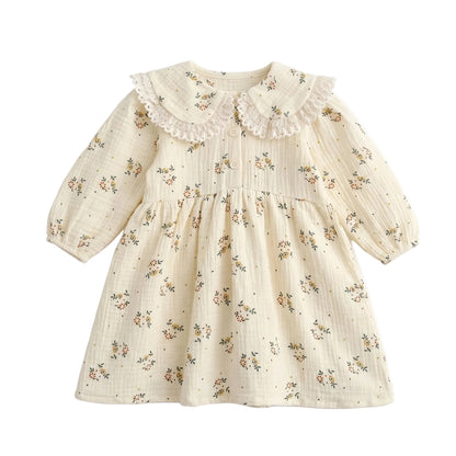 Girls floral cotton muslin long sleeve dress in cream with a vintage lace Peter Pan collar.