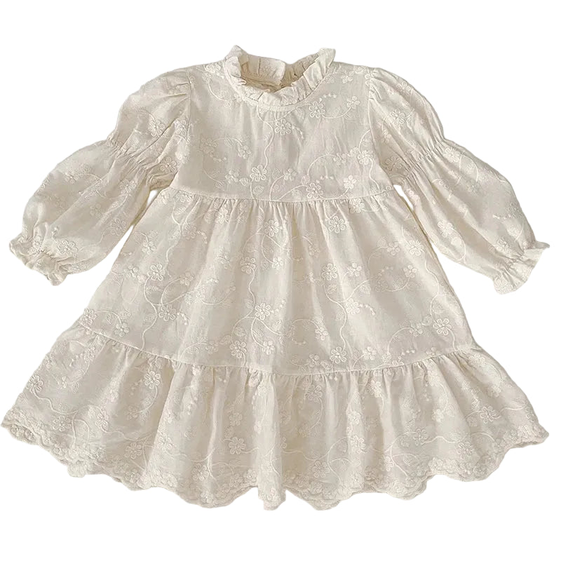 Front view of girls ivory floral embroidered cottagecore dress with long bishop sleeves and tiered A-line skirt.