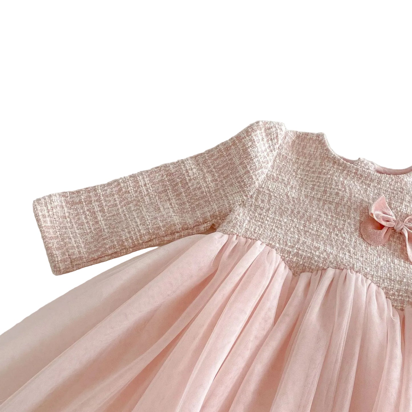 Detailed close-up view of the rounded neckline and regular long sleeve stitching on the pink special occasion tweed dress.