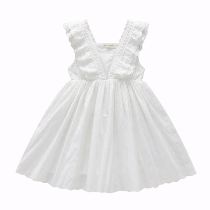 Flat lay of a girls white lace sleeveless princess dress with ruffle flutter sleeves and tiered skirt on a neutral background.