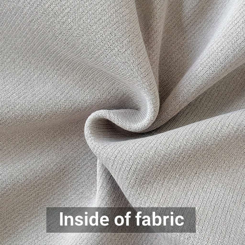 Close-up showing the smooth interior knit texture of the grey cotton blend fabric for the baby's skin.