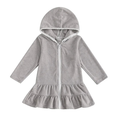 Heather grey girls' hooded zip-up swim coverup with long sleeves and decorative white pom-pom trim on the hood.