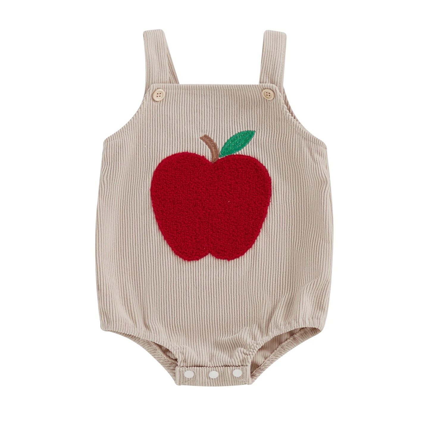 The Harvest Orchard romper in light beige ribbed corduroy with a vibrant red apple embroidery.