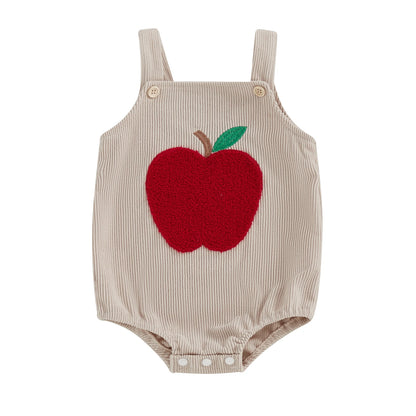 The Harvest Orchard romper in light beige ribbed corduroy with a vibrant red apple embroidery.