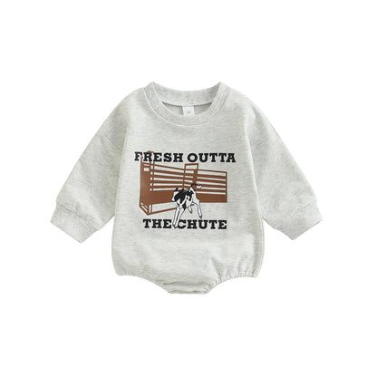 Light heather grey long sleeve baby bubble romper featuring a rodeo graphic and the text Fresh Outta The Chute.