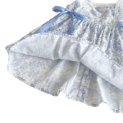 Interior view of the cotton blend lining and hem finish of the girls summer dress.